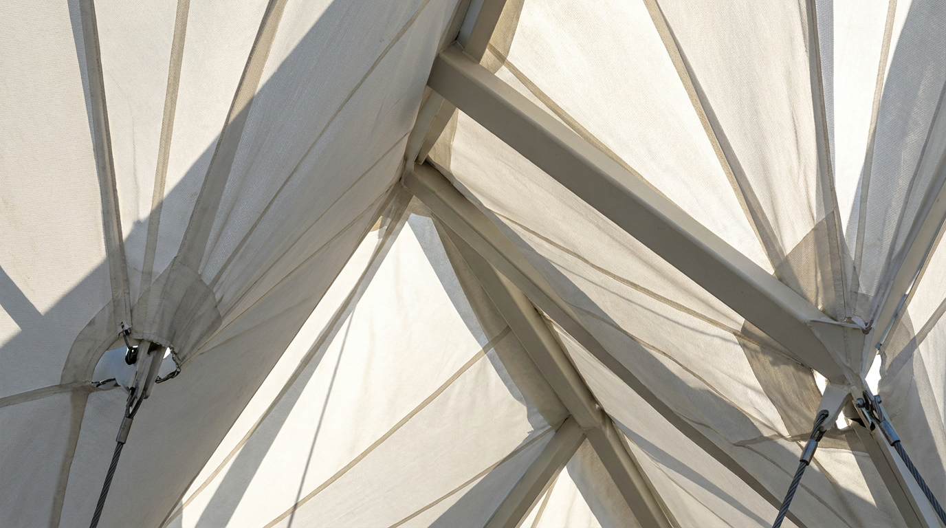 Macro detail of raw canvas and structural stitching